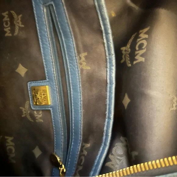 AUTHENTIC blue MCM Stark backpack with studs